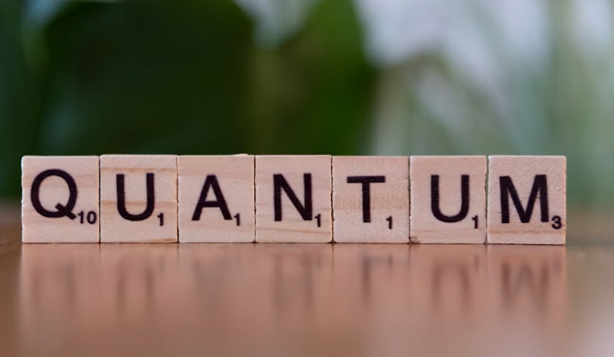 scrabble tiles spell out quamtum